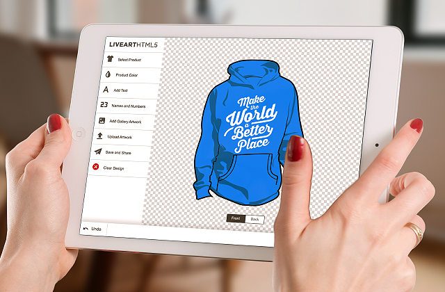 Woman holding tablet with LiveArt Html5 designer and designing hoodie